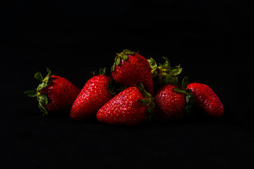 Some strawberry in a black background