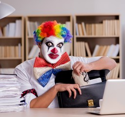 Clown businessman working in the office