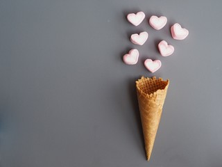 ice cream cone Mini heart fly on background