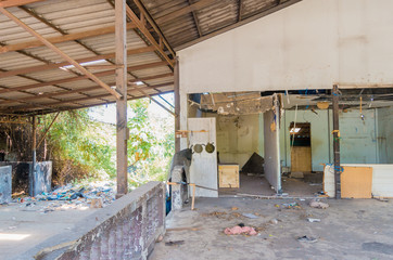 The inside of an abandoned house on a structure-only road.