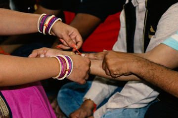 closeup of hands of a man and woman