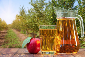apple juice in glass and jug