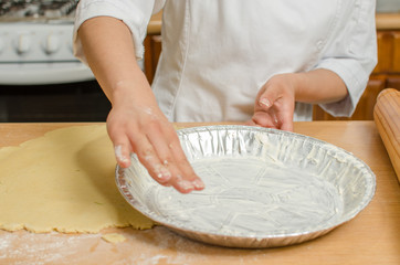 preparing mold for pie