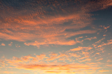 Dramatic of sunset fluffy cloud flying on blue sky as texture and background