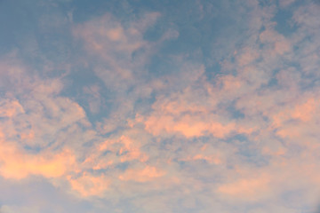 Dramatic of sunset fluffy cloud flying on blue sky as texture and background