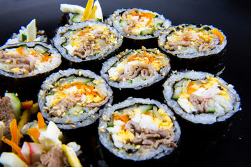 Korean food, wraping rice with seaweed and filled with vegetables and beef