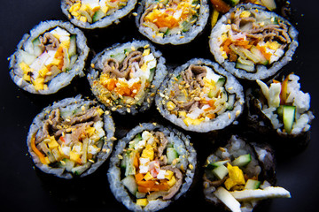 Korean food, wraping rice with seaweed and filled with vegetables and beef