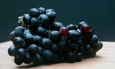 Dark blue wine grapes background