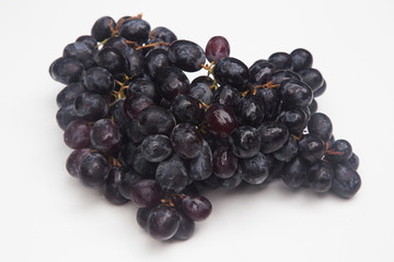 Dark blue wine grapes background