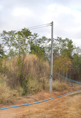 Fototapeta premium Water pipes on the dry ground in rural areas