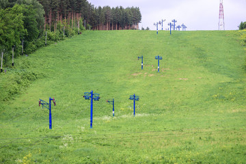 Lift with iron poles and cables for lifting people on the mountain.