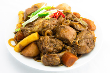Korean chicken stew with soy sauce, glass noodle, rice cake and vegetables