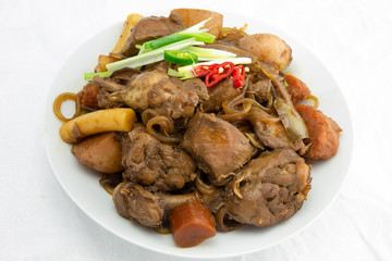 Korean chicken stew with soy sauce, glass noodle, rice cake and vegetables