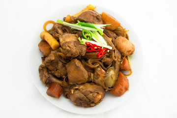 Korean chicken stew with soy sauce, glass noodle, rice cake and vegetables