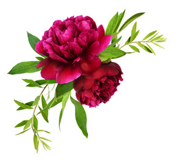 Red peony flowers and green leaves in a floral arrangement