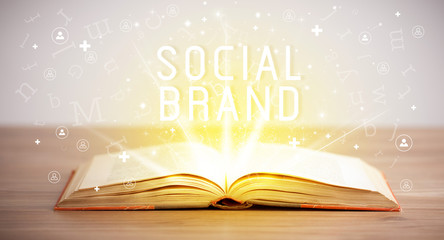 Open book with SOCIAL BRAND inscription, social media concept