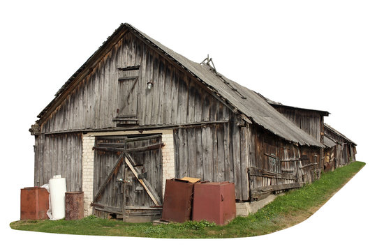 Abandoned aged  wooden vintage  retro  rural shed  barn for storage of firewood and agricultural tools isolated