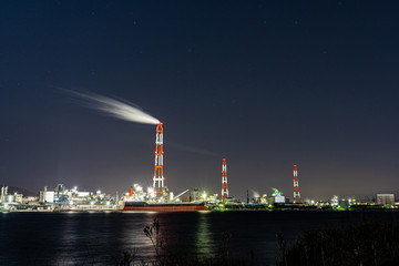 Obraz premium night view of factory in japan