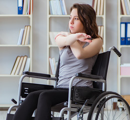 Patient undergoing rehabilitation recovery programme with doctor
