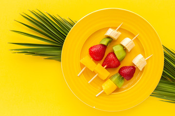 Healthy assorted fruit skewers from above