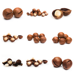 Macadamia nut with pieces and green leaves isolated on a white background