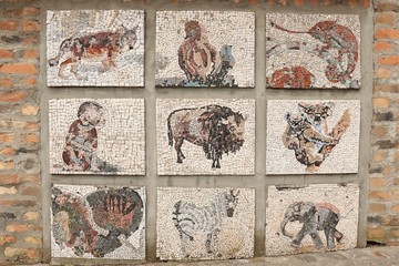 Fototapeta na wymiar Mosaic depicting different animals and birds.