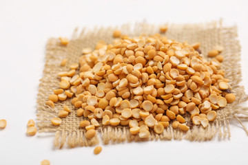 Dried chickpea lentils on white background , Split Chickpea Also Know as Chana Dal