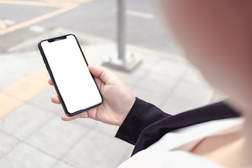 Business woman hand holding phone isolated on screen display check stock exchange in market world and investment with friend investor