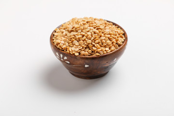 pigeon pea also known as toor dal in wooden bowl.