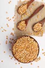 pigeon pea also known as toor dal in wooden bowl and spoon