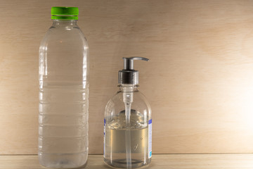 Packaging of water and alcohol gel on light background