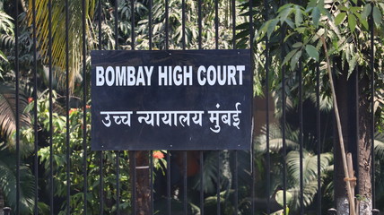 Mumbai, Maharastra/India- March 25 2020: Sign board of the Bombay High Court.  - obrazy, fototapety, plakaty