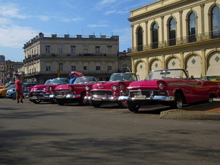 Havana,Cuba - January 24, 2020 : American convertible vintage cars parked on the main street in Havana Cuba.