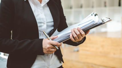 businesswoman working with documents in office