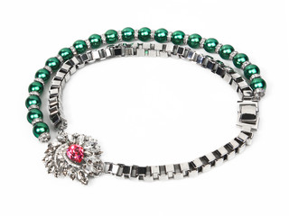 Women`s wrist bracelet with green beads