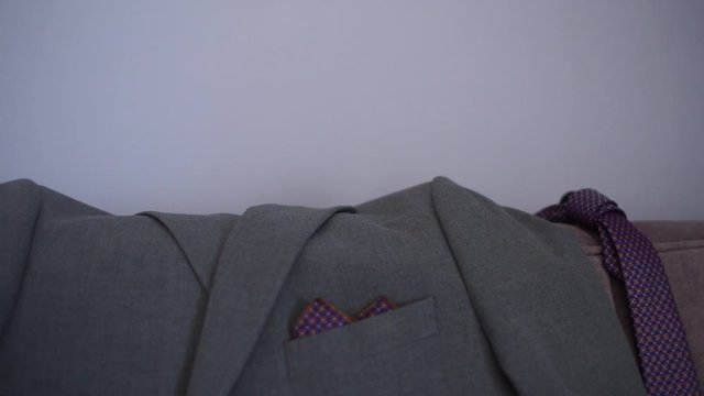 men's jacket on the couch