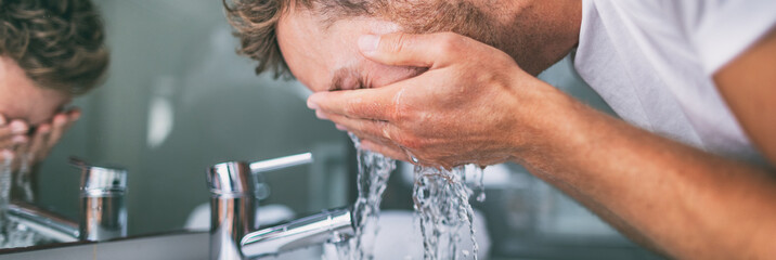 Man washing face splashing water in bathroom sink male skincare beauty morning routine panoramic...