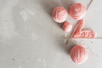 Incomplete knitting project with wooden needles