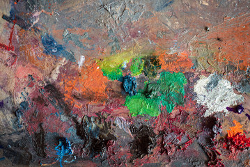 closeup of art palette with colorful paint
