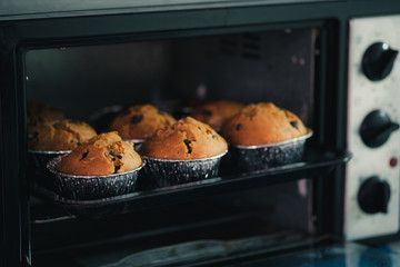 Home made delicious banana with grain cake in oven.