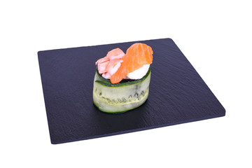 Traditional fresh japanese sushi on black stone Gunkan Ebi Shake on a white background. Gunkan...