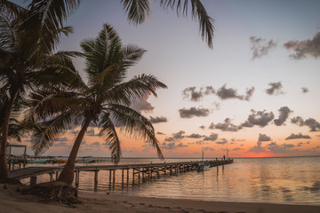 Fototapeta premium Sunrise San Pedro Belize Beach Pier Boat Central America