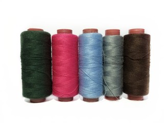colorful sewing thread isolated on white background