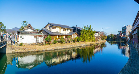 Fototapeta premium Riverside landscape reflection on the river, Kyoto, Japan