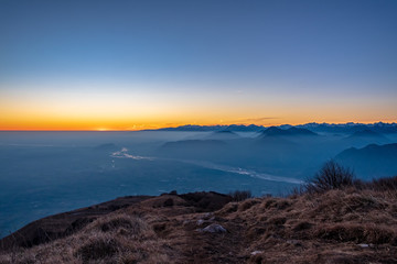 Winter sunset from an alpine peak of Friuli-Venezia Giulia