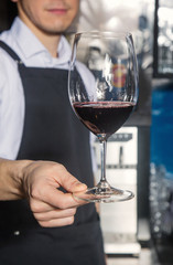 glass of wine in the hand