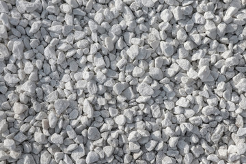white pebbles on the entire frame as a background	