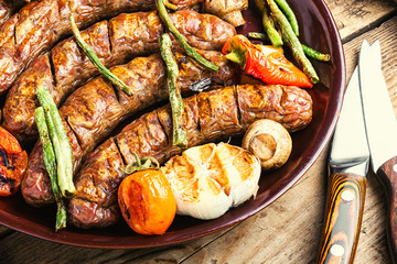 Sausages fried with vegetable