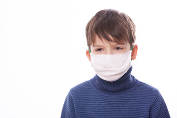 A child in a medical mask during the coronovirus in the world.