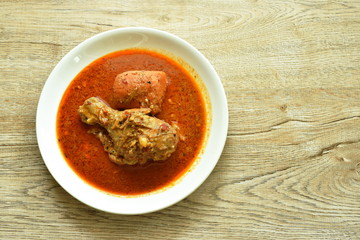 chicken leg spicy and sweet curry or mussaman on dish